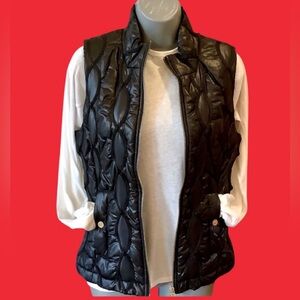 MICHAEL Michael KORS black basic puffer vest with gold logo hardware.